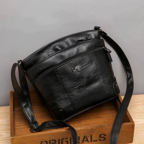 Carolyn - veganläder crossbodyväska