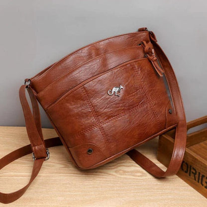 Carolyn - veganläder crossbodyväska